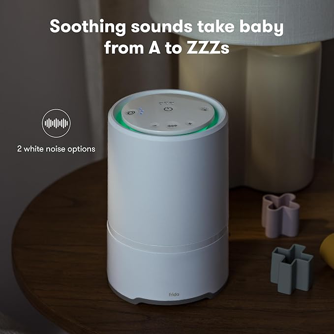 Frida Baby 3-in-1 Baby Air Purifier for Allergy Relief, Sound Machine for Sleeping + Nightlight, HEPA Filter Purifier for Bedroom with 3 Fan Speeds, Easy-Change Filter, Auto-Off Timer